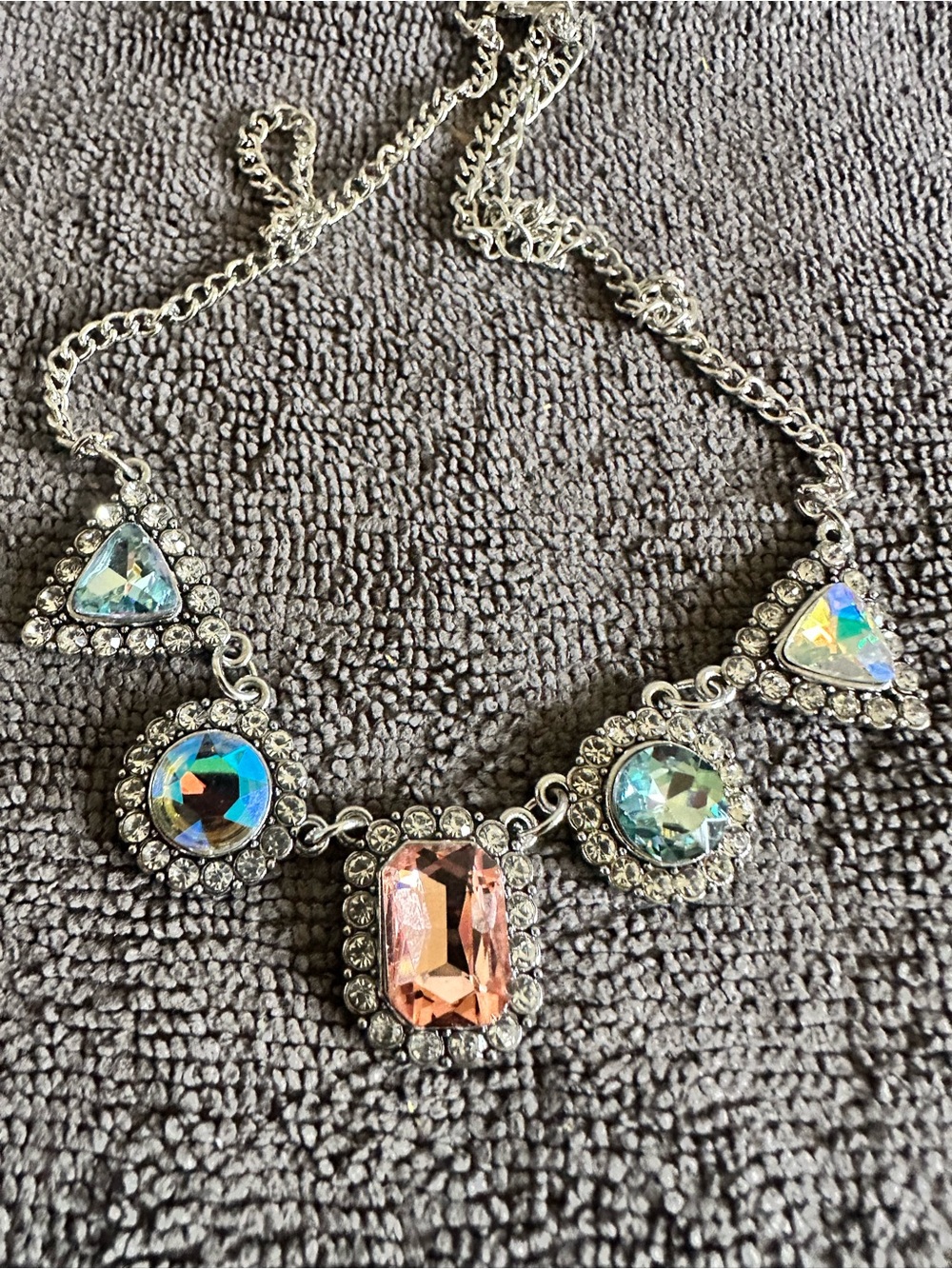 Unlisted Silver-Tone Necklace with Pink Center and Iridescent Accents
